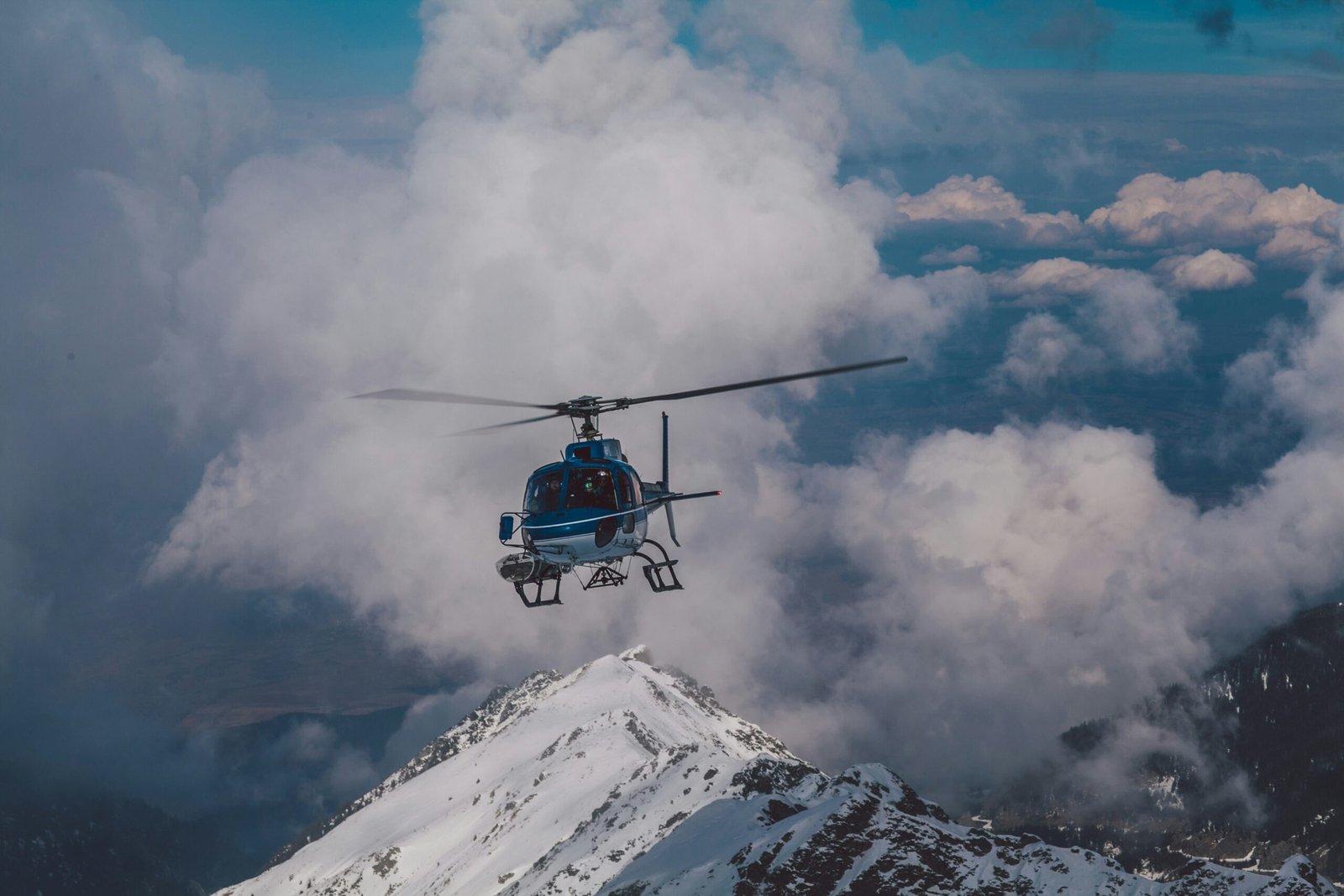 blue helicopter in the air